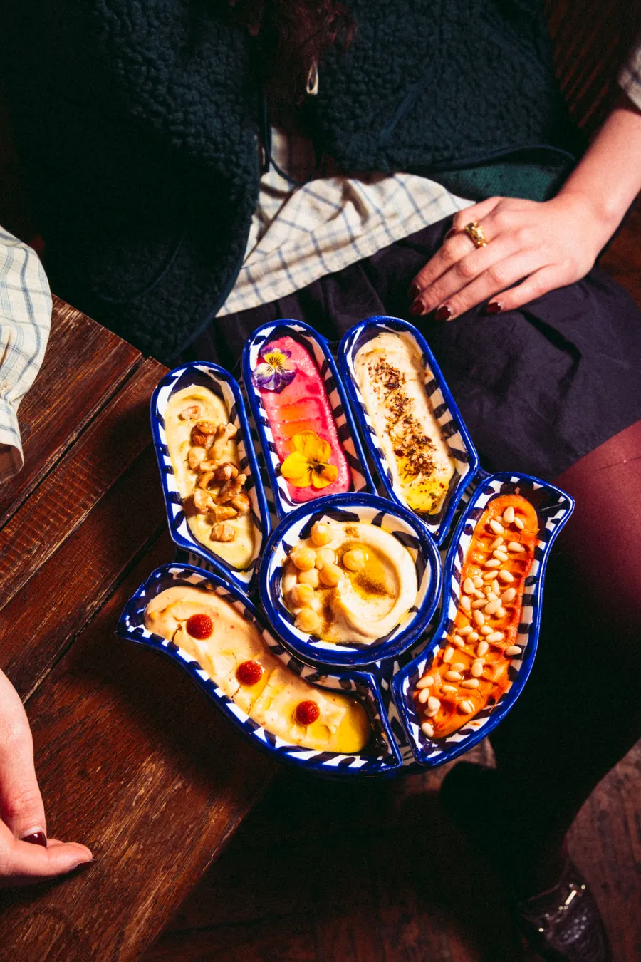 Colourful hummus served at Nômadâ, Mediterranean restaurant in Barrio Salamanca, Madrid
